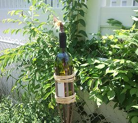 wine bottle tiki torches, gardening, repurposing upcycling