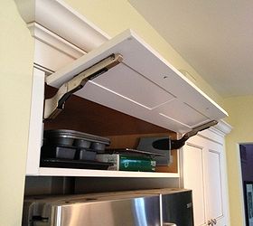kitchen cabinet storage solutions, kitchen design, shelving ideas, storage ideas, This unique awning or uplift style cabinet hinge makes the tray shelf easily accessible