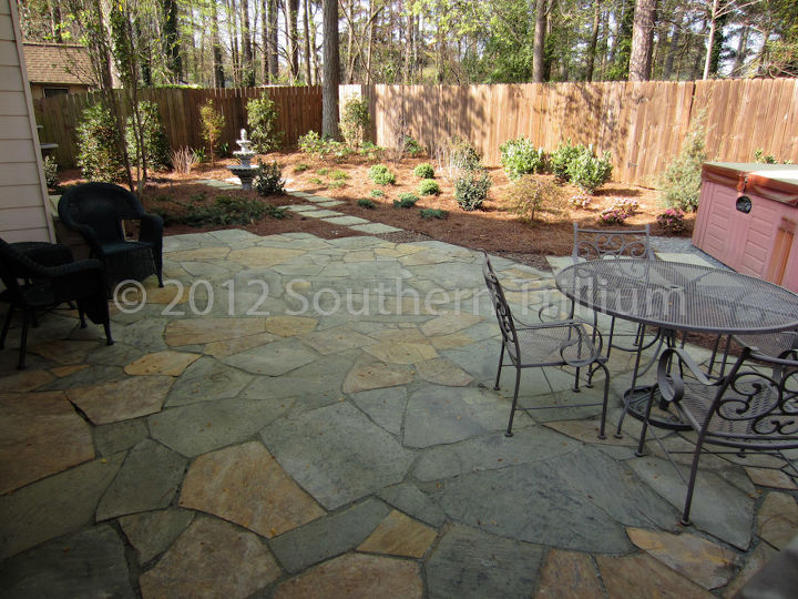 a few photos of a recent installation no more grass but a nice stone patio hot, concrete masonry, landscape, outdoor living, perennial, pool designs, spas, A look at the mostly complete installation No more grass in the backyard