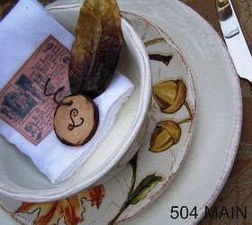autumn tablescape, seasonal holiday decor, A custom napkin with a vintage label and a wood disc with each guests initials accent the dinnerware
