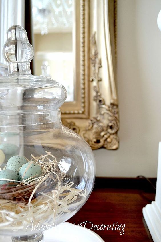 2013 easter dining room, dining room ideas, easter decorations, seasonal holiday decor, A simple cloche from Home Goods serves as a fun way to display a sweet nest filled with robins eggs