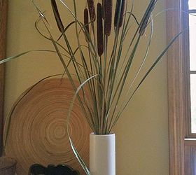 preserving cattails for decor use, gardening, home decor, The cattails look simple and elegant on the mantle Learn how to arrange them by reading the post