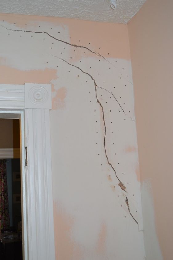 how to repair a large crack in plaster, diy, home maintenance repairs, how to, wall decor, Start by Drilling 5 16 holes 1 or 2 inches from the crack and about 3 inches apart Use a Masonry Bit