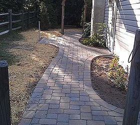 paver patio, concrete masonry, patio, Pathway leading to patio in back of home