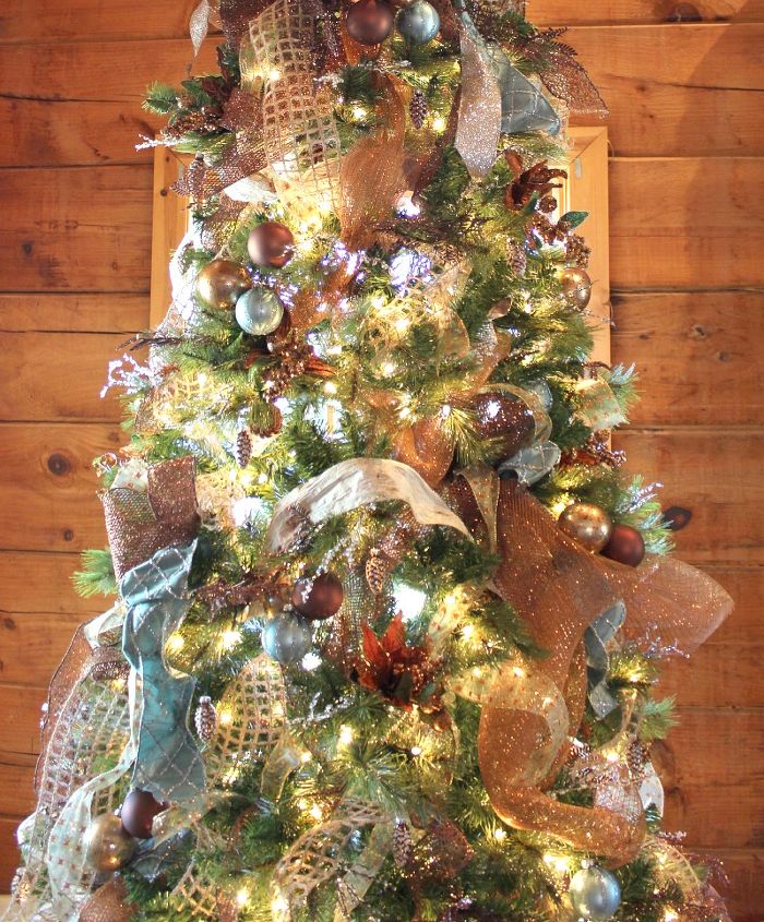 log cabin main christmas tree, christmas decorations, seasonal holiday decor, I found some beautiful bronze mesh ribbon and bronze and blue ornaments that were perfect for the tree But my favorite find was the burlap ribbon