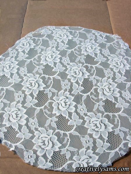 a lacy table, painted furniture, I pressed the adhesive side of the lace to the little glass table top to make sure the lace had no air spaces