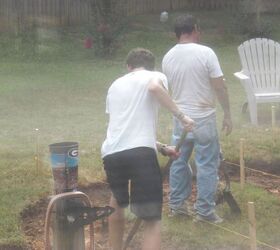 down home southern firepit, concrete masonry, diy, how to, outdoor living, Pouring rain but still digging