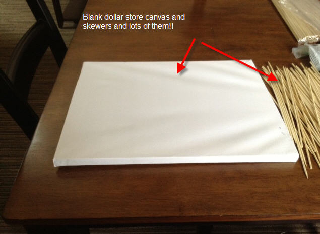 I read up on the tutorial and decided to give it a try and make one of my own.
I picked up a canvas that cost a whole dollar$$$$! I then went on search for chopsticks, I found chopsticks but there were only 5 sets per package, at that price I may as well by a piece of artwork at a store somewhere. So I opted to switch it up a bit and use skewers instead.