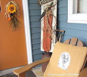 a rustic vintage fall covered patio, outdoor living, seasonal holiday decor, Trouser hanger fall swag fall shutter and much more