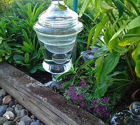 recycled glass garden art towers, crafts, repurposing upcycling