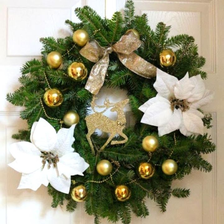 diy white and gold dollar tree wreath, christmas decorations, crafts, seasonal holiday decor, wreaths, I used the ornament garland to weave it through the wreath