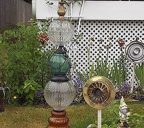 recycled glassware and lamps into garden totems and bird baths, gardening, repurposing upcycling, This one is old glass lamp bottoms witht he same treatment on top