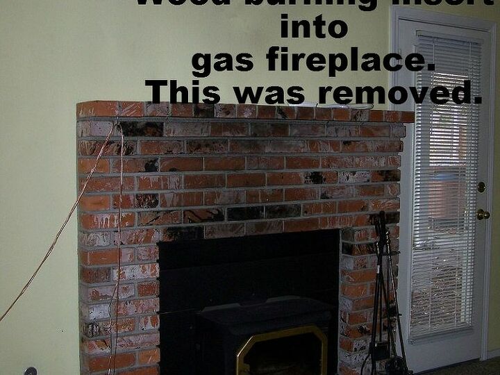 q question about an electric fireplace, home decor, living room ideas, Originally a gas fireplace the gas insert was removed and a wood burning insert was put in Not up to code it was removed when we bought the house