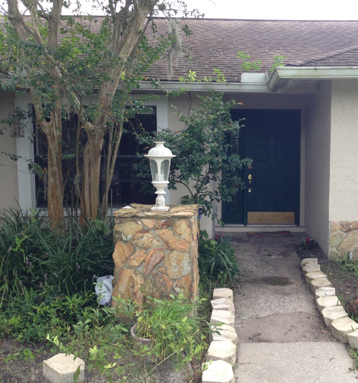 q front door makeover, curb appeal, diy, doors, how to, painting, This is a further view of the door I want a color that doesn t contrast too much from the stone As you can see we are in the process of redoing a lot but the front door is in need of a makeover