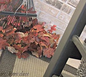 decorating the front porch for fall, home decor, seasonal holiday decor, I used a couple of leaf garlands and our rake to recreate a look from an inspiration source