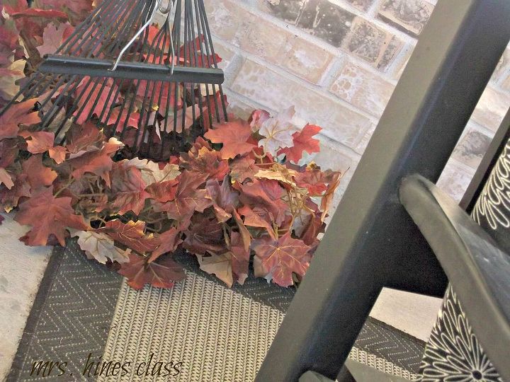 decorating the front porch for fall, home decor, seasonal holiday decor, I used a couple of leaf garlands and our rake to recreate a look from an inspiration source
