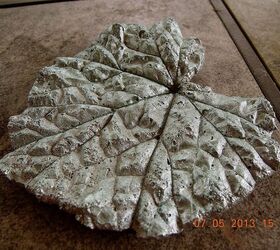 making garden art birdbaths, I added some metallic paint glaze to the smaller leaves I used a light green a darker one dry brushed them