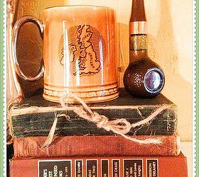 vintage st patrick s day display, repurposing upcycling, seasonal holiday decor, I displayed a Mug with Ireland Scotland England and Wales on it I paired it with another Avon cologne bottle on top of vintage books