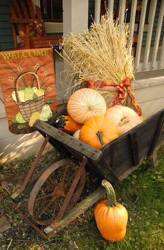 fall front porch decor, porches, seasonal holiday decor, I brought the old wagon out and filled it with gourds pumpkins and wheat stalks