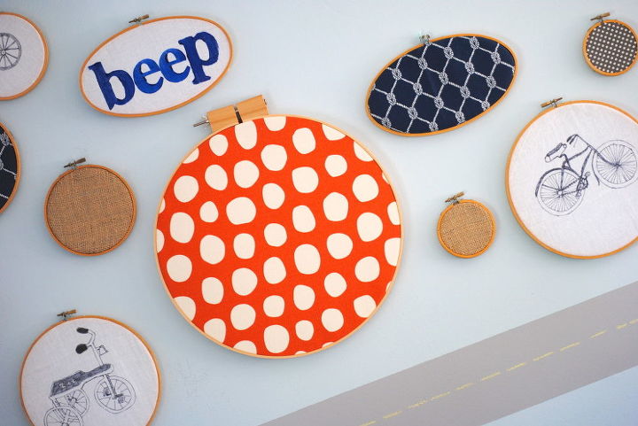 top home projects of 2013, crafts, home decor, Create artwork in minutes with this easy tip use embroidery hoops Some contain fabric other stamped words and others have artwork traced with permanent marker All are loved by my son