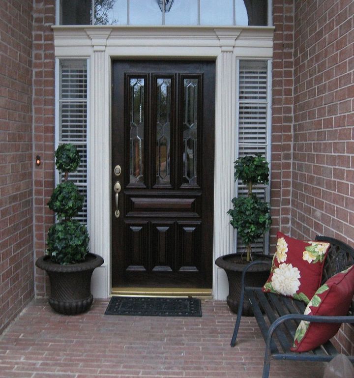 updating curb appeal by freshening up the front porch, curb appeal, outdoor living, Front porch cleaned up and ready for spring Planters and Pillows are versatile and pretty and can make any space feel welcoming