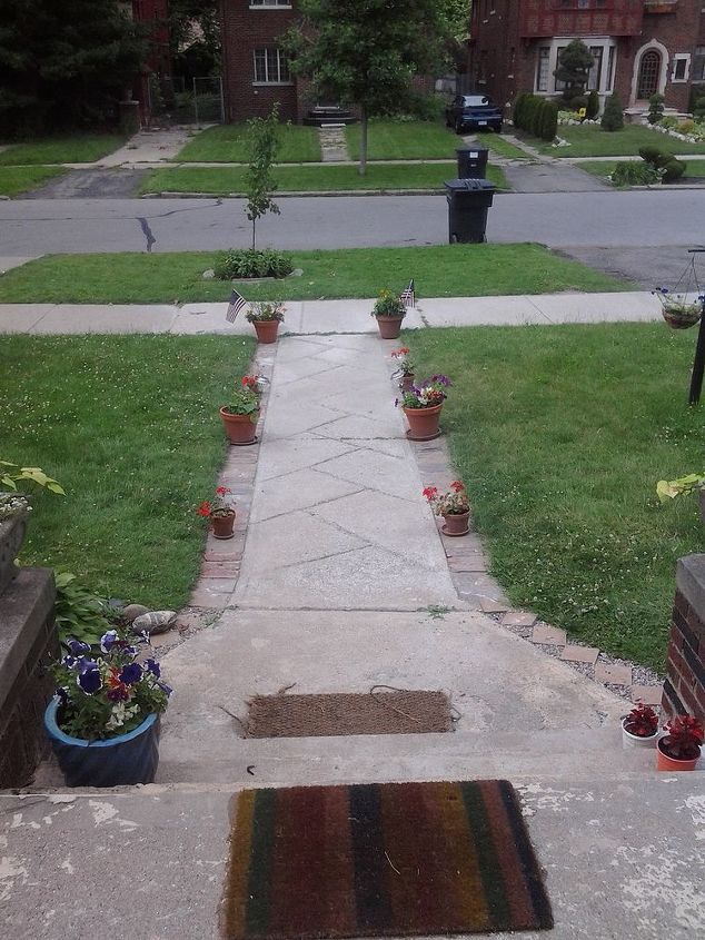 q help with my lawn, flowers, gardening, landscape, walk way looking down both left and right sides
