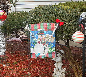 fall halloween down decked the porch with winter holiday colors, christmas decorations, decks, porches, seasonal holiday decor, wreaths, A winter flag I grabbed from a second hand shop