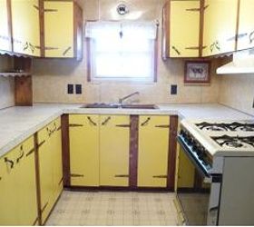 trailer kitchen renovation, home decor, kitchen design, before a single light over the window questionable yellow cabinets messed up wall covering