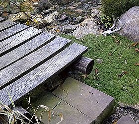 a babbling brook with a bridge