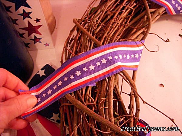 patriotic wreath tutorial, crafts, patriotic decor ideas, seasonal holiday decor, wreaths, Finish gluing ribbon where you started