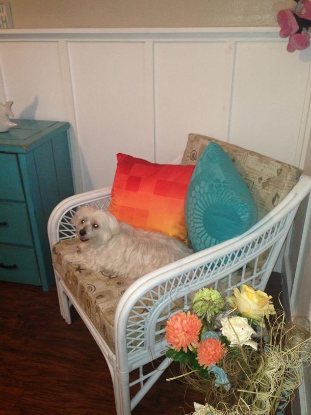 cottage beach guest bedroom, bedroom ideas, home decor, We also bought this wicker chair for about 25 and spray painted the chair and my aunt bought new foam for cushions My aunt also sewed a new cushion using beachy fabric