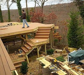 concidering a composite deck deck building trick and tips from our outdoor living, decks, outdoor furniture, outdoor living, patio, Trick Plan the deck this staircase hugged the deck so it would not interfere with the patio below