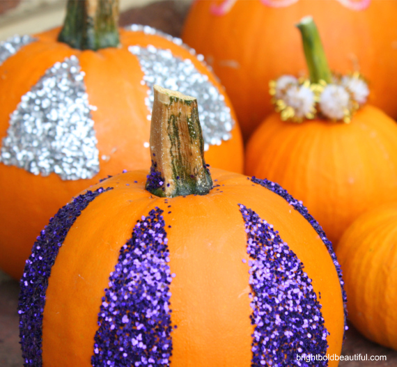 no carve pumpkin decorating idea, crafts, seasonal holiday decor, Place duct tape from top to bottom in a pattern of your choice