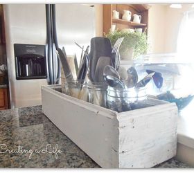 no budget adding vintage character to a contemporary kitchen, home decor, kitchen backsplash, kitchen design, kitchen island, Old wooden planter box holds extra flatware and more at the end of the center island