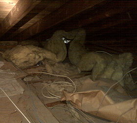 is your house cold drafty expensive to heat, heating cooling, home maintenance repairs, Notice the paper backed insulation This is kindling for the light fixtures that overheat and spark because of poor wiring practices found in this attic
