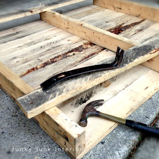 a junk styled pallet wood coffee table anyone can make, diy, painted furniture, pallet, woodworking projects, This pallet had straight nails so it was a breeze to take apart with a hammer and crowbar The wood then received a good sanding and dry fit after the pieces were cut