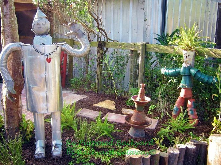 re purposed backyard, gardening, repurposing upcycling, Tinman from A C duct materials