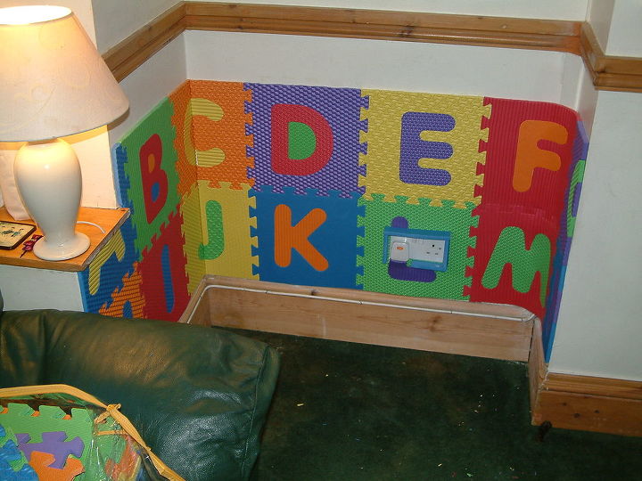 a babys play corner in the living room, home decor, living room ideas, I stuck the foam alphabet letters straight onto the wall making it soft for trips and falls i made a cover for the sockets out of foam too