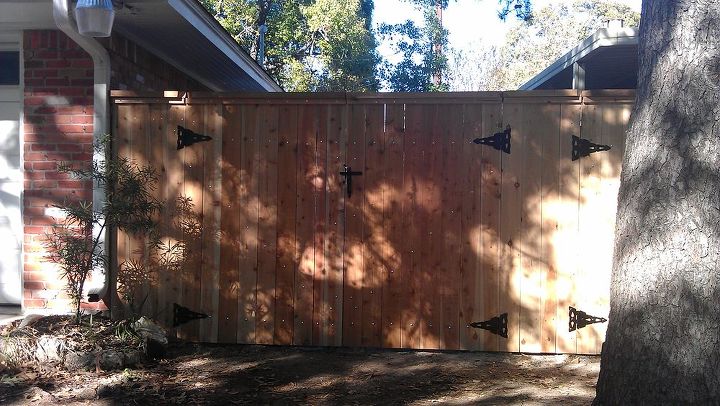 cedar wood fence with a doble door, fences, outdoor living, cedar wood fence with a doble door