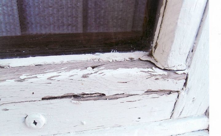 repaint exterior of house and shed, curb appeal, painting, Closeup of window sill Shows damage from the elements