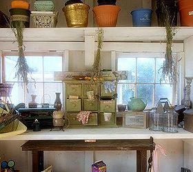 cottage redo inside, home decor, potting shed inside I love the mood The cabinet in the middle I paid a lot for but HAD to have it I am also drying my own lavender from last year you can see it hangin