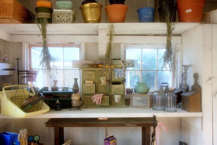 cottage redo inside, home decor, potting shed inside I love the mood The cabinet in the middle I paid a lot for but HAD to have it I am also drying my own lavender from last year you can see it hangin