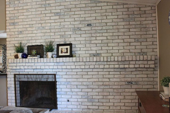 how to white wash your fireplace or brick, concrete masonry, fireplaces mantels, painting, It s a messy project the paint splatters a bit but the results are like night and day I wish I would have done this years ago