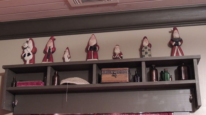 a country kind of christmas, christmas decorations, fireplaces mantels, living room ideas, seasonal holiday decor, My father past away 3 years ago and before he died he gave me these santas he carved they are dear to me