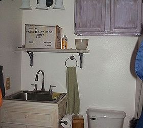 laundry room makeover under 450 with recycled shelves cabinets more, cleaning tips, laundry rooms, repurposing upcycling, shelving ideas, New laundry sink shelves light and painted cabinet in the 1 2 bath area