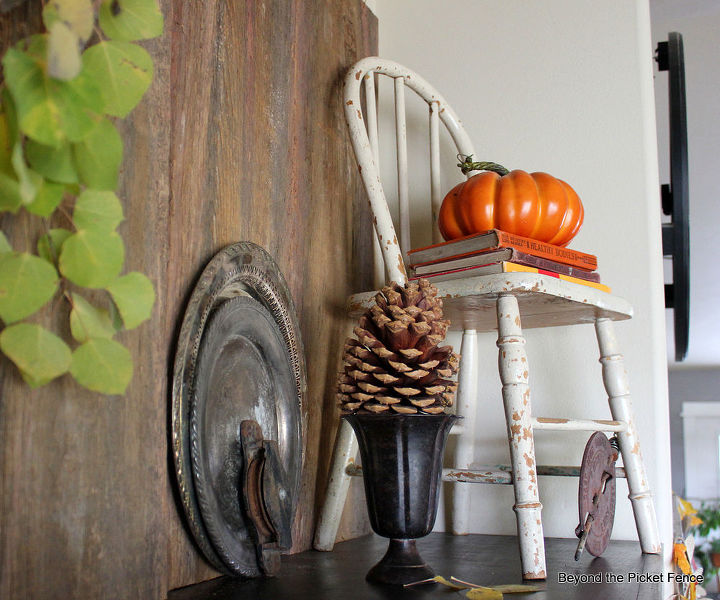 adding junk to your decor, seasonal holiday d cor, A child s chair a small table step ladder overturned bucket create vertical interest