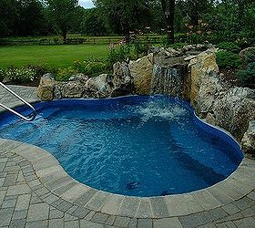 a hot tub with room for 19, outdoor living, patio, pool designs, spas, Spool cross between a spa and a pool with moss rock waterfall Great idea for small backyards See more creative photos at