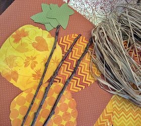 fun easy and inexpensive pleated paper pumpkins, crafts, seasonal holiday decor, Here s all you need scrapbooking paper sticks from the yard and raffia Get the full tutorial on my blog