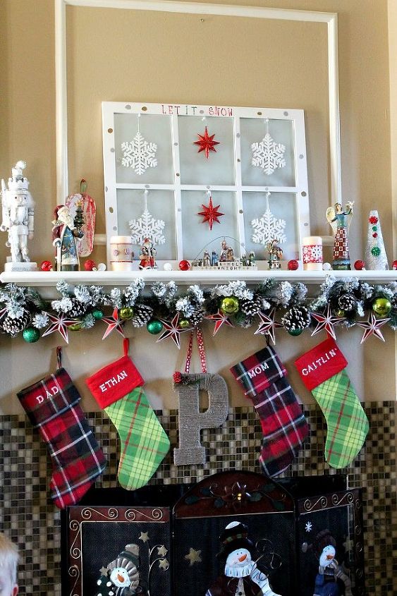 family friendly christmas decor, christmas decorations, seasonal holiday decor, wreaths, Mantle with DIY window hand stenciled stockings and DIY candle decor