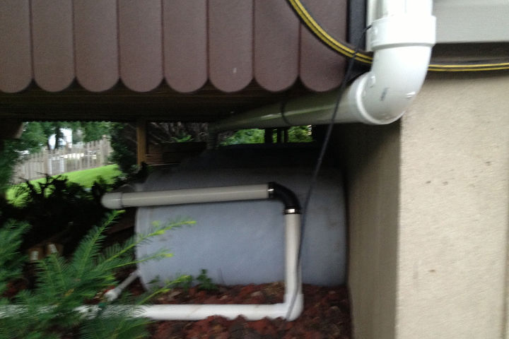 connecting rain barrels for extra water harvesting, gardening, go green
